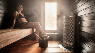 Woman enjoying authentic Finnish sauna