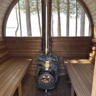 IKI Mini wood-burning heater in a sauna by Lake Superior